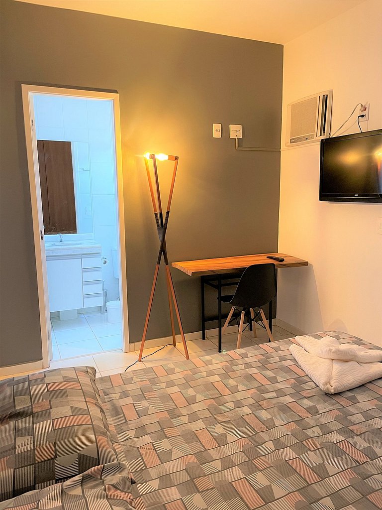 Apt con suite cerca de compras AC + WIFI +Tv SMART