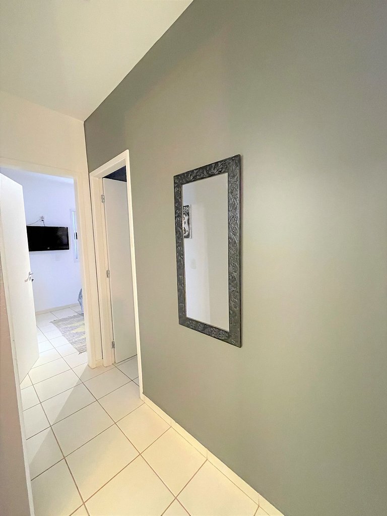 Apt con suite cerca de compras AC + WIFI +Tv SMART
