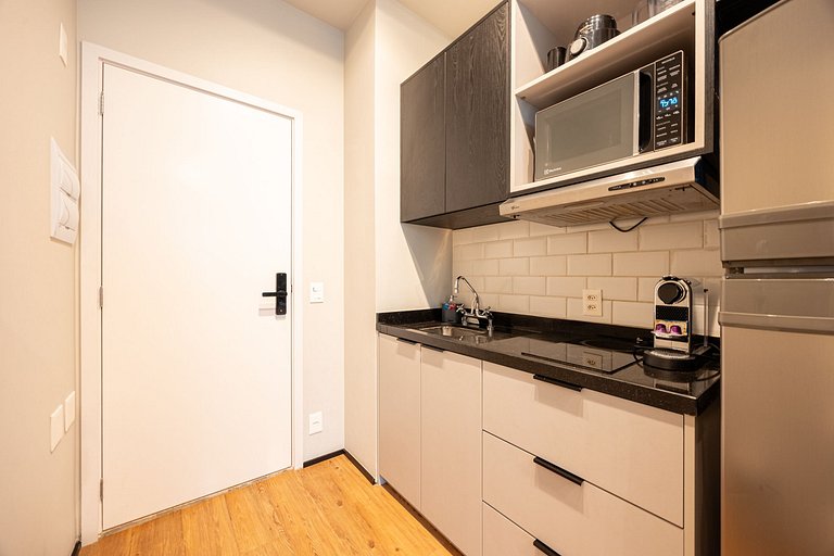 Charmoso studio com cama queen em Moema