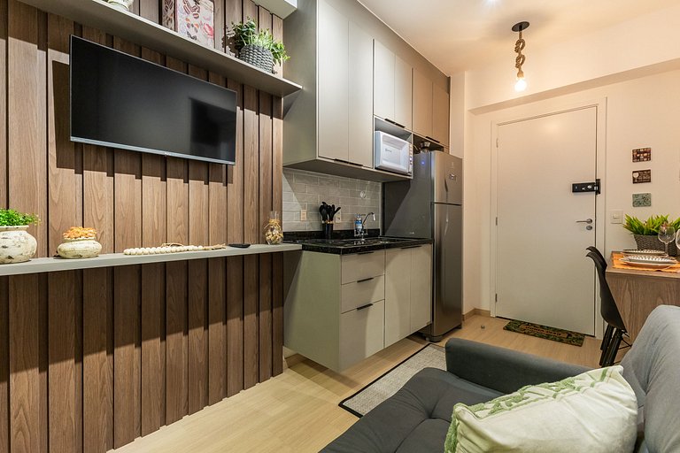 Charmoso studio com cama queen em Pinheiros